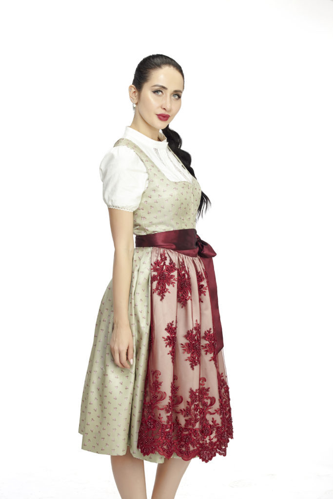 a dirndl dress with white, green and red color