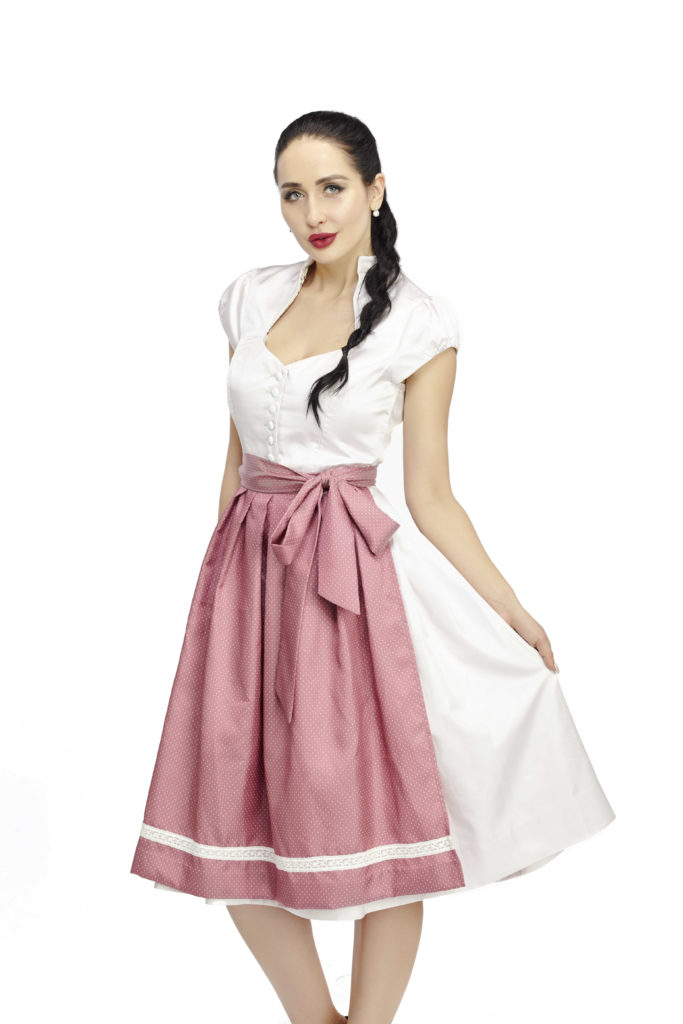 um vestido dirndl branco e rosa