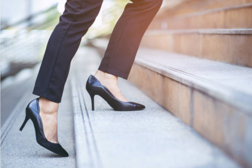 a pair of black high heel shoes